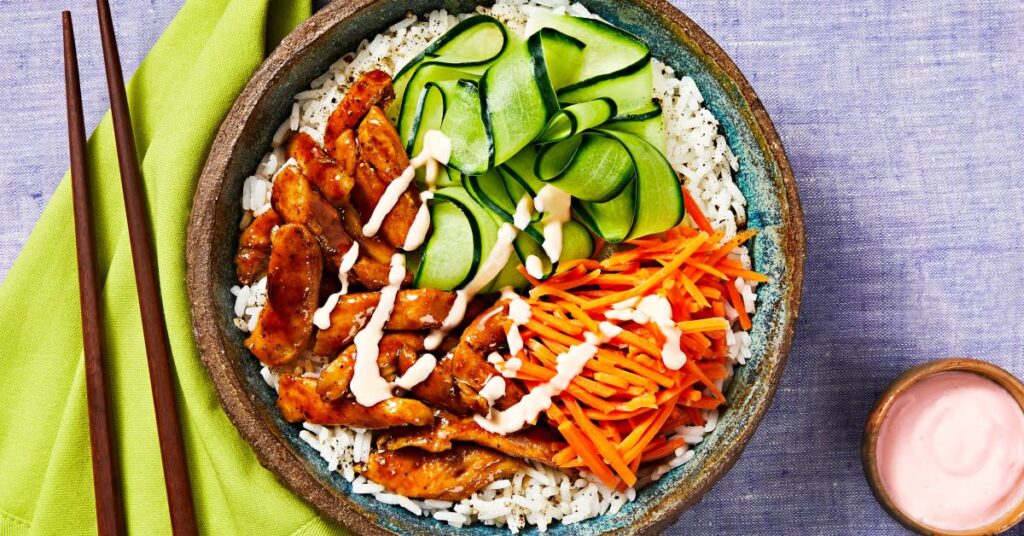 Chicken Bulgogi Bowl with carrots and cucumber